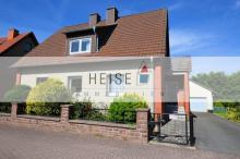 1- bis 2-Familienwohnhaus mit Doppelgarage in ruhiger Wohnlage mit kleinem Gartenteich Haus kaufen 37699 Fürstenberg Bild klein