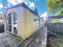 Attraktives Chalet auf dem Campingplatz Heideruh in Uelsen/Getelo Haus kaufen 49843 Uelsen Bild klein