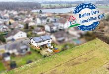 DIETZ: Großzügiges 2-Familienhaus in attraktiver Feldrandlage! Niedermittlau - Bahnhofssiedlung Haus kaufen 63594 Hasselroth Bild klein