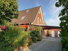 Doppelhaushälfte mit Garage, Carport und großem Garten im Zentrum Haus 49843 Uelsen Bild klein