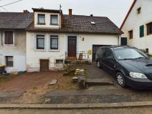 Einfamilienhaus in Gersheim – 140 m² Wohnfläche, vermietet & attraktive Kapitalanlage! Haus kaufen 66453 Gersheim Bild klein