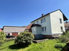 Gepflegter ehemaliger Hof mit Nebengebäuden und großem Grundstück Haus kaufen 35327 Ulrichstein Bild klein