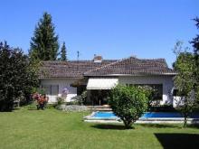 Gepflegter Walmdach-Bungalow mit Pool und Werkstatthaus Haus kaufen 82054 Sauerlach Bild klein