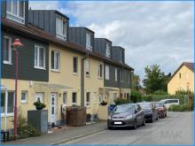 MAK Immobilien empfiehlt: 3 langfristig vermietete Reihenhäuser zu verkaufen Gewerbe kaufen 14532 Stahnsdorf Bild klein