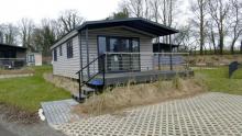 Möbliertes Ferienhaus mit Sonnenterrasse auf Pachtgrund in Scharbeutz nahe Ostsee Haus kaufen 23683 Scharbeutz Bild klein
