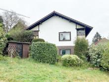 **RESERVIERT** Freistehendes Einfamilienhaus mit ca. 100 m² Wohnfläche auf einer Ebene zuzüglich wohnraummäßig ausgebautes Untergeschoss Haus kaufen 64397 Modautal Bild klein