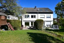 Schöne Doppelhaushälfte mit großem Grundstück, Kamin, Garage und Stellplatz am Haus - zentrumsnah! Haus kaufen 42489 Wülfrath Bild klein