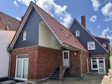 Vermietung einer traumhaften Dachgeschosswohnung - mit Blick auf den Heider Marktplatz Wohnung mieten 25746 Heide Bild klein