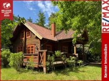 Wochenendhaus / Rundbohlenblockhaus /
Am See / Waldlage /
Erholung Pur Haus kaufen 26215 Wiefelstede Bild klein