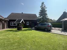 Wohnhaus mit EBK, Kaminofen, Garage, Carport und Ausbaufläche! Haus kaufen 26629 Großefehn Bild klein