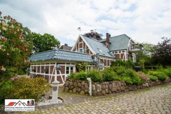 Einfamilienhaus Friesenhaus in Schönkirchen, ca. 200m² mit lebenslangem Wohnrecht Haus kaufen 24232 Schönkirchen Bild mittel