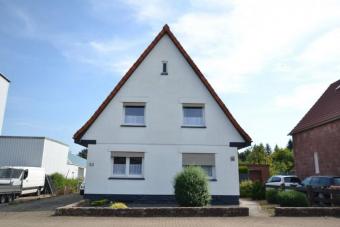 Einfamilienhaus mit großem Grundstück Haus kaufen 37627 Stadtoldendorf Bild mittel