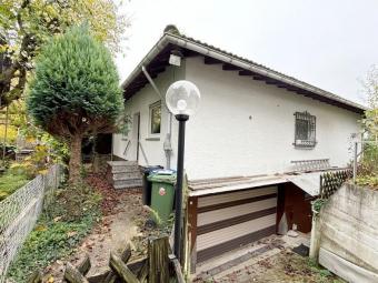 Gemütlicher Walmdachbungalow mit Potenzial, Charme und Freiraum für individuelle Gestaltung Haus kaufen 64367 Mühltal Bild mittel