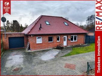 * Gepflegter Bungalow * Beheizter Außenpool * Heizungsanlage neu * Haus kaufen 26817 Rhauderfehn Bild mittel