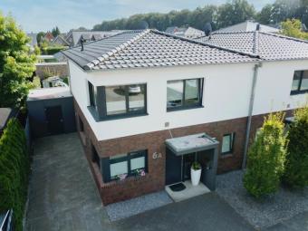 ## RESERVIERT ## Moderne Doppelhaushälfte in zentraler Lage von Uelsen. Haus kaufen 49843 Uelsen Bild mittel