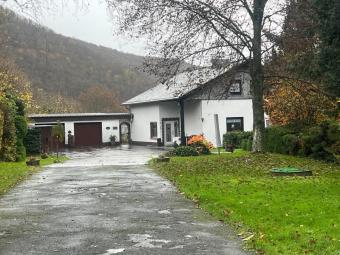 Top-Gelegenheit! Einfamilienhaus mit ELW und großem Grundstück in Bruschied/Rudolfshaus Haus kaufen 55606 Bruschied Bild mittel